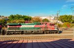 FXE AC4400 Locomotives leading a mixed freight train